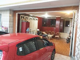 SPOT ON 93880 Guest House Bu Iin Syariah