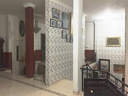 SPOT ON 93880 Guest House Bu Iin Syariah