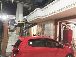 SPOT ON 93880 Guest House Bu Iin Syariah