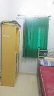 SPOT ON 93880 Guest House Bu Iin Syariah