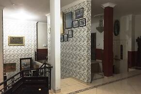 SPOT ON 93880 Guest House Bu Iin Syariah