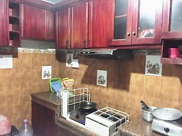 SPOT ON 93880 Guest House Bu Iin Syariah