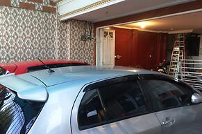 SPOT ON 93880 Guest House Bu Iin Syariah