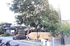 SPOT ON 93880 Guest House Bu Iin Syariah