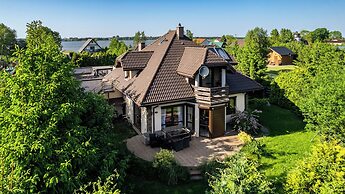 Apartamenty Sun & Snow Podamirowo Prywatna Willa nad Jeziorem Jamno