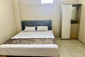 OYO 93838 Delia Inn Syariah