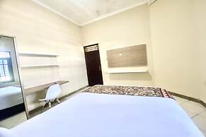 OYO 93838 Delia Inn Syariah