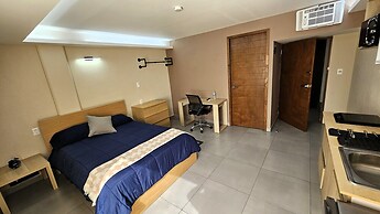 A07 SUPER CITY SUITES AT PLAZA ACEQUIA