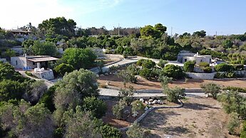 Villa Agapanto - Trullo Anthos con Vista Mare e Giardino Privato