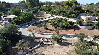Villa Agapanto - Trullo Anthos con Vista Mare e Giardino Privato