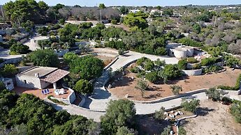 Villa Agapanto - Trullo Agap con Vista Mare e Giardino Privato