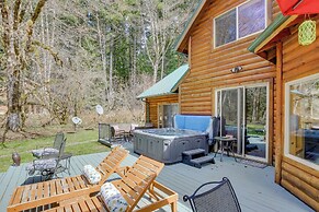 Peaceful Rhododendron Cabin w/ Fire Pit & Hot Tub!