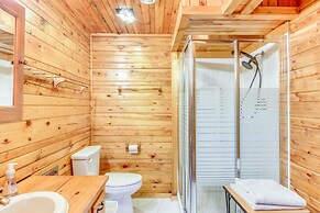 Lakefront Park Rapids Cabin w/ Decks & Boat Dock!