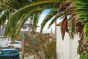 Coastal Palm Tree 2BR Retreat Ocean View