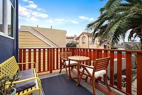 Coastal Palm Tree 2BR Retreat Ocean View