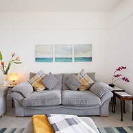 Absolute Beachfront With Decked Garden Oasis and Views