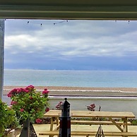 Absolute Beachfront With Decked Garden Oasis and Views