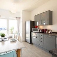 Absolute Beachfront With Decked Garden Oasis and Views