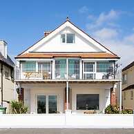 Absolute Beachfront With Decked Garden Oasis and Views