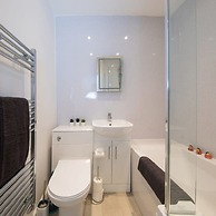 Absolute Beachfront With Decked Garden Oasis and Views