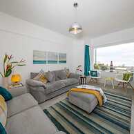 Absolute Beachfront With Decked Garden Oasis and Views