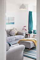 Absolute Beachfront With Decked Garden Oasis and Views