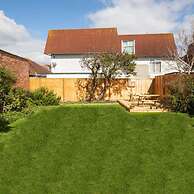 Absolute Beachfront With Decked Garden Oasis and Views