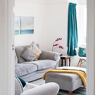 Absolute Beachfront With Decked Garden Oasis and Views