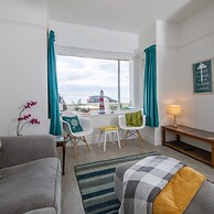 Absolute Beachfront With Decked Garden Oasis and Views