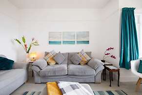 Absolute Beachfront With Decked Garden Oasis and Views