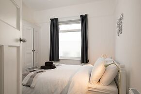 Absolute Beachfront With Decked Garden Oasis and Views