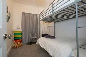 Absolute Beachfront With Decked Garden Oasis and Views