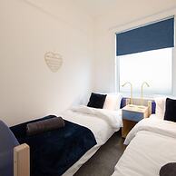 Beautiful Beachfront House wth Balcony Sea Views