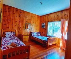 ROOMS AT AN AMERICAN-STYLE CABIN