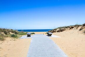 Oasis Steps From Beach Outdoor Shower and Dining