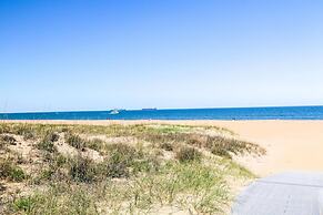 Oasis Steps From Beach Outdoor Shower and Dining