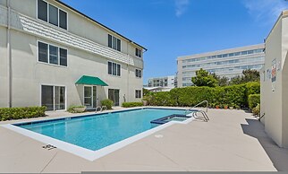 Shore to Please Condo With Pool Views of Beach