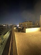 Cozy and Tranquil Rooftop Near Al Services 23