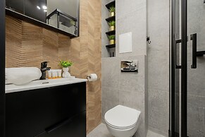 Black & Wooden Apartment by Renters