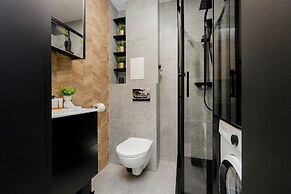 Black & Wooden Apartment by Renters