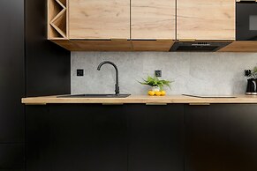 Black & Wooden Apartment by Renters
