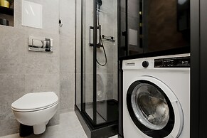 Black & Wooden Apartment by Renters