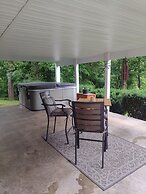 Riverside Serenity: A Picturesque Retreat 2 Bedroom Cottage by RedAwni