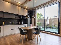 w Monochrome Loft With Terrace in Parque 93