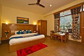 Goroomgo New Harmony Inn Manali