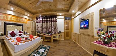 Goroomgo New Harmony Inn Manali