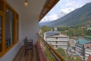 Goroomgo New Harmony Inn Manali