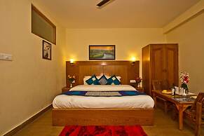 Goroomgo New Harmony Inn Manali