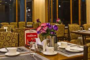 Goroomgo New Harmony Inn Manali