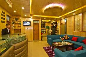 Goroomgo New Harmony Inn Manali